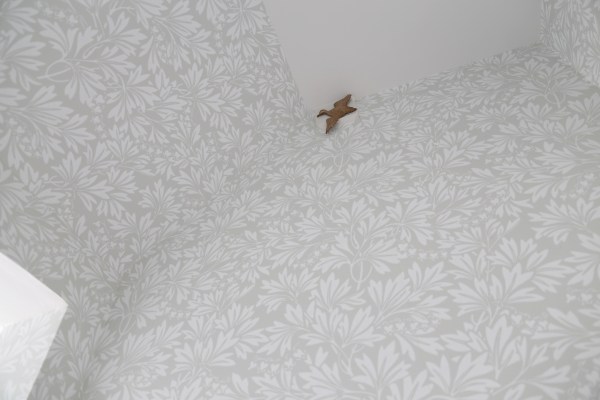 Brass Bird Flying in a Bathroom.jpg