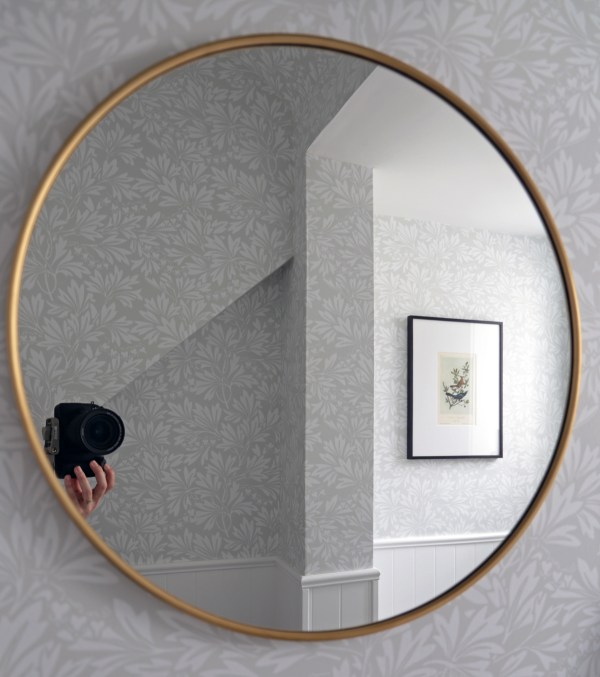 Round Brass Mirror in Bathroom.jpg