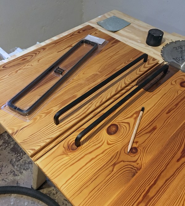 Installing Handles on Doors.JPG